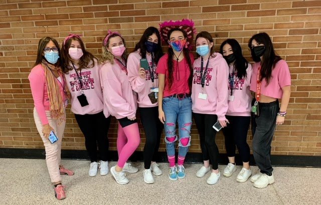 Here is one winner of the “Pinkest” costume contest and some cancer awareness members! They raised almost $300!!