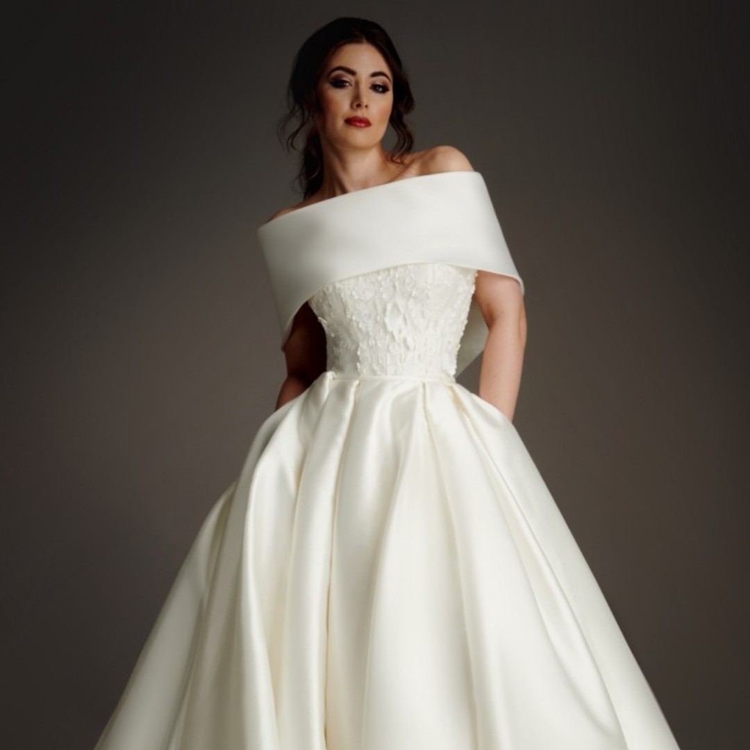 The stunning Alyssa dress from our sister label Grace Philips. A strapless Mikdao ballgown with 3D lace detail and detachable capelet worthy of any princess bride. Pockets giving a modern twist houseofmooshki.com/grace-philips-…