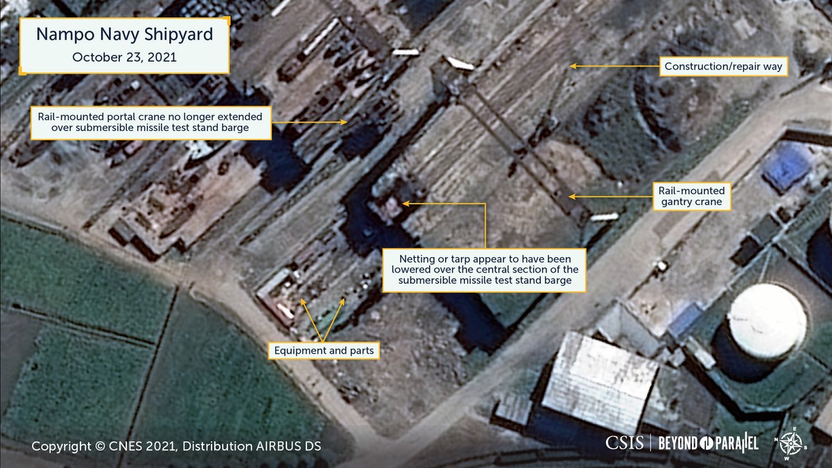 Satellite imagery collected during the past two weeks shows activity on the submersible missile test barge located at the Nampo Navy Shipyard.