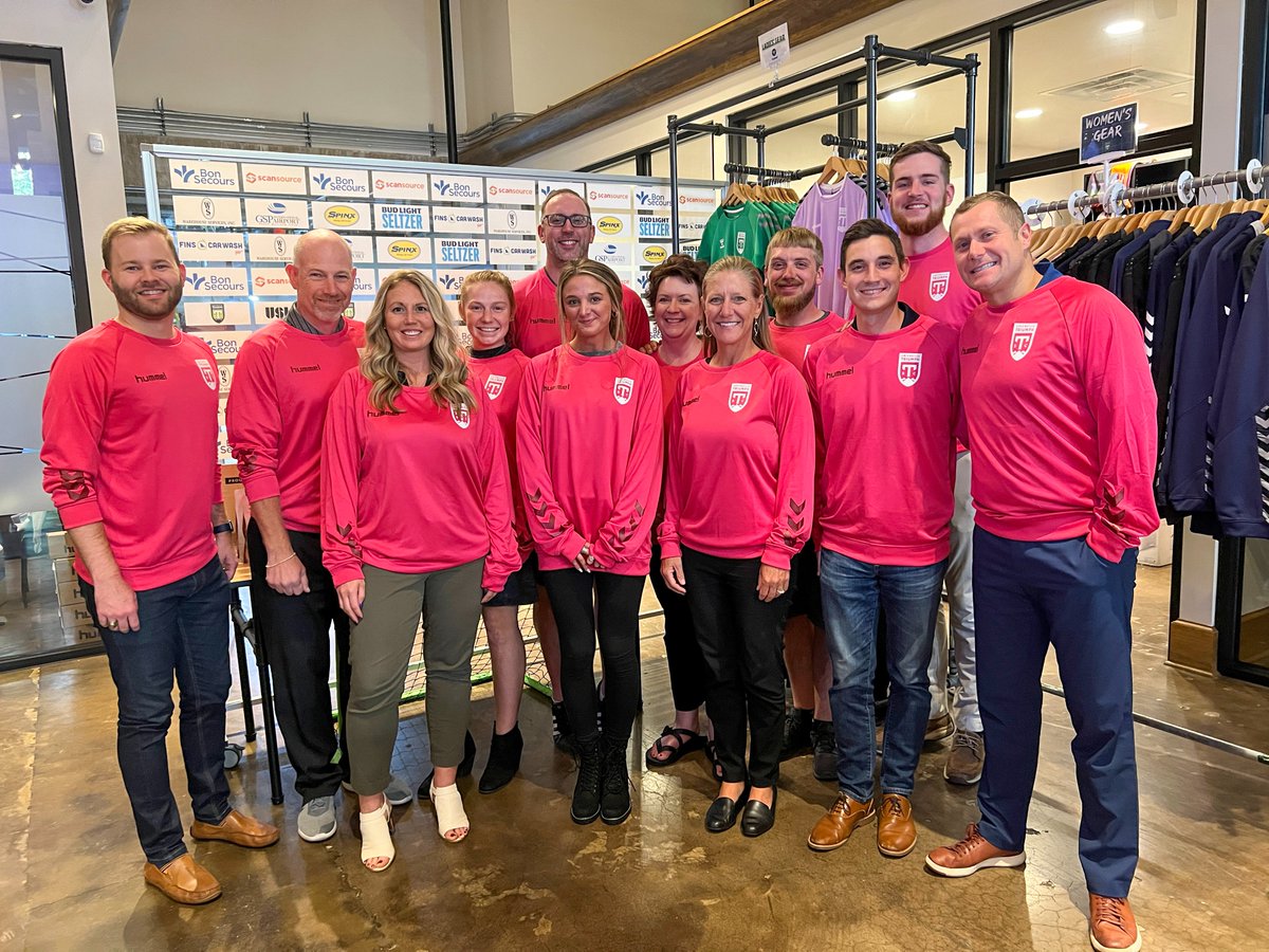Our front office staff wearing our @hummelUSA pink and showing support for <a href="/_AaronWalker/">Aaron Walker</a>'s Real Men Wear Pink campaign to fight breast cancer! 

Learn more about Aaron's campaign and donate here: bit.ly/3GkfacS