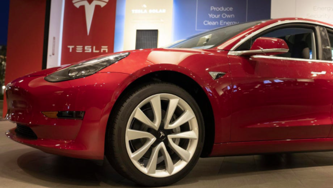 Forbes's tweet photo. Tesla eclipses $1 trillion in market value after Hertz places the biggest electric vehicle order ever https://t.co/Y1KMTz1Tnf https://t.co/4m7PH8oloT