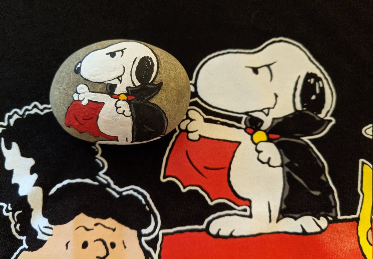 aPaintedRock's tweet photo. Inspired by my Halloween t-shirt! I never tire off Snoopy 🙂 #paintedrocks https://t.co/RuJrceclWK