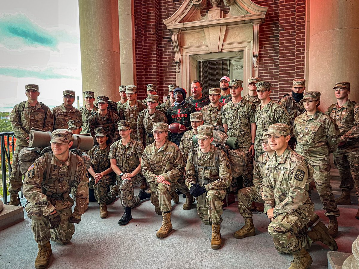 BretBielema's tweet photo. Really awesome moment with Illini ROTC presenting the game ball to #FamILLy ⁦@lukeford82⁩ ⁦@D1Tstrain⁩ https://t.co/faz3PrUMRj