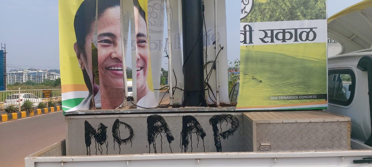 AITCofficial's tweet photo. It's a SHAME that the @BJP4Goa govt has to resort to such cheap tactics to defame the one woman that all of #Goa is waiting for!

Ahead of @MamataOfficial's visit, BJP miscreants made a shoddy attempt to destroy our branding that featured Didi.

Is this democratic in any way? https://t.co/coY2qgbunq