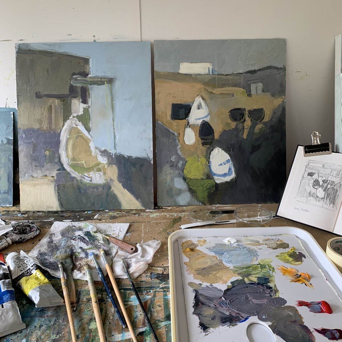 S_Jennings_art's tweet photo. Having fun with oil paints and not square boards for a change. Will see how they go. Hot soup for lunch I think. Itโs been freezing in the studio with the window open!! ๐ฅถ#artstudio
#studiopractice
#boats
#harbour
#inspiredbycornwall
#workinprogress
#blue
#grey
#abstractart https://t.co/YFk4x4RGxa