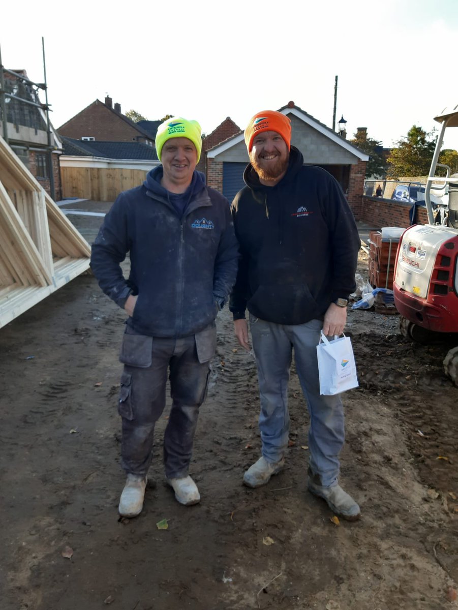 Justin Doughty and the one and only Ben Sprake proving that the @eastsuffolkCouncil Building Control hats really can make them look sparkling ! Keep warm, safe and visible on site.