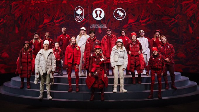 Team Canada athletes standing on a stage in red and white clothing
