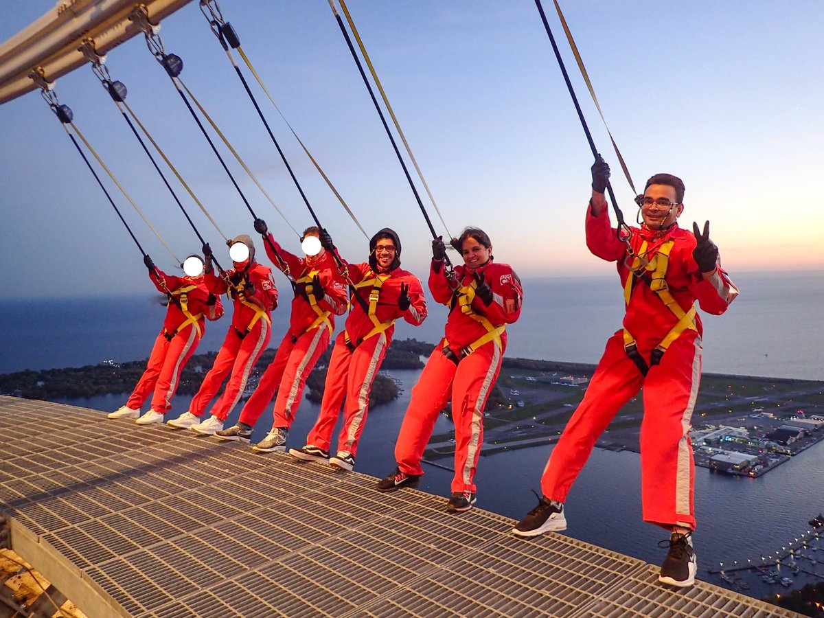 dunnhumbylife's tweet photo. Don’t look down! Our dunnhumby Toronto team went for a walk around a very big attraction – the CN tower! At 356m high, this is the highest hands-free external walk in the world. #dunnhumbylife #dhToronto #notyouraveragewalk #NotMostPeople #DefyExpectations #teambonding https://t.co/oO6eGzzG42