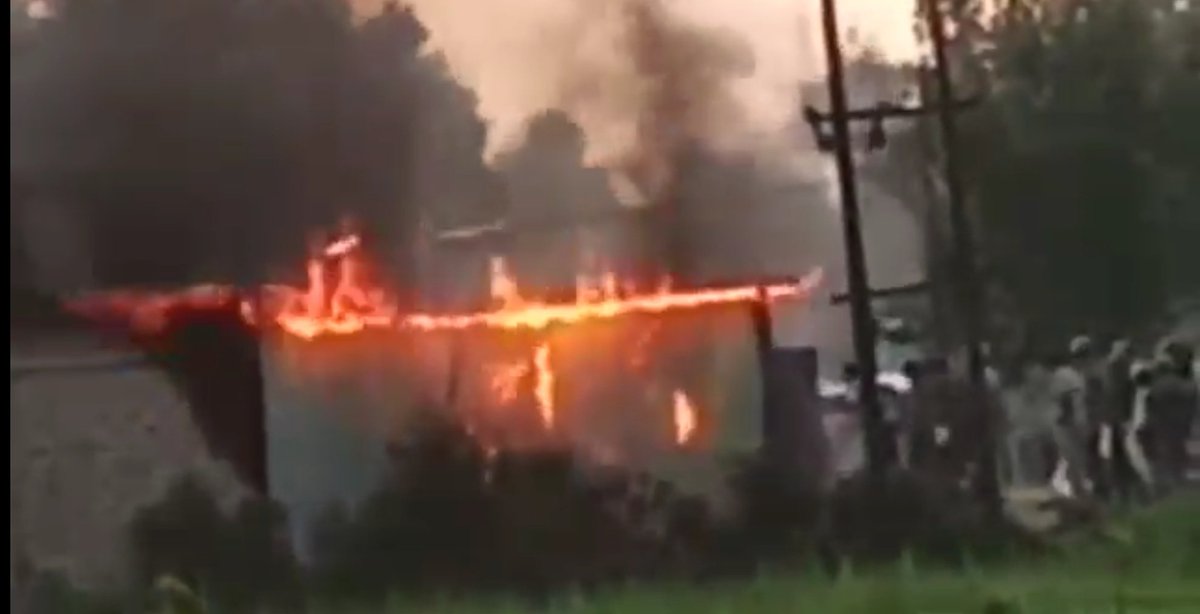 khanamtn's tweet photo. Burning the shop's of muslims in, Rowa, Panisagar,North Tripura. when rally organised by Vishwahindu parisad,RSS,Hindu yuva vahini passes through in Muslims area.@writesalman 
@Samriddhi0809 @MuslimSpaces @asadowaisi https://t.co/Eu0iJvt2U1