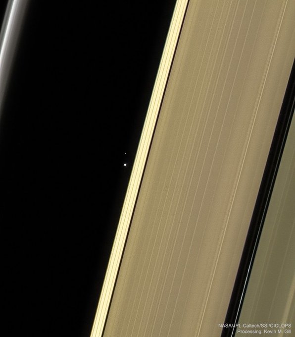 Rainmaker1973's tweet photo. What are those dots between Saturn's rings? Our Earth &amp; Moon. Just about 5 years ago, because the Sun was temporarily blocked by the body of Saturn, the robotic Cassini spacecraft was able to look toward the inner Solar System [processed by @kevinmgill https://t.co/47q0oVXWEK] https://t.co/FakfO5HtdC