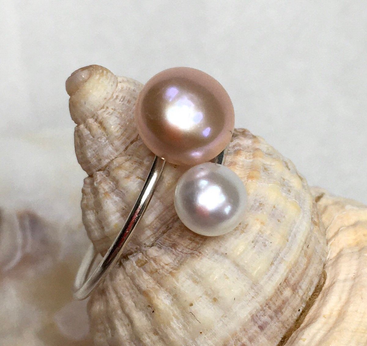 wackyjackyful's tweet photo. Excited to share this item from my #etsy shop:
A beautiful, adjustable pearl ring, with pink and white pearls
#pearl #contemporaryring https://t.co/TaDMObrhBb https://t.co/4fZzYc0c0v