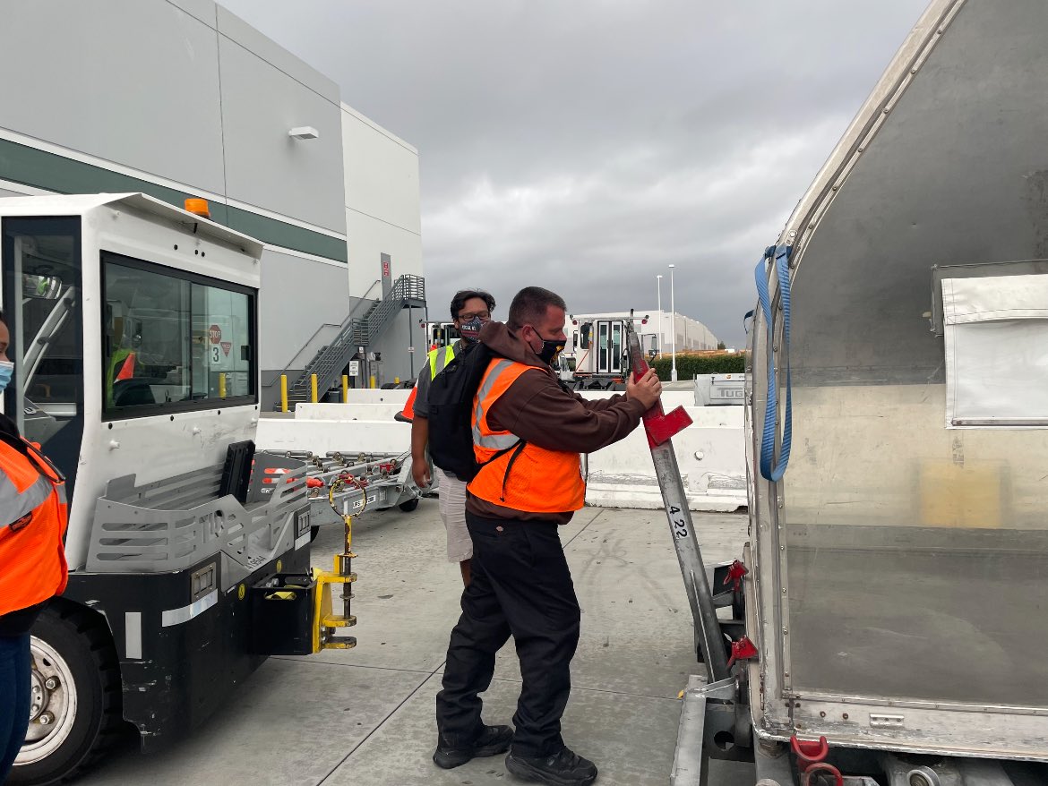 Hands on mentoring with our new hires, on the daily dangers of dollies!