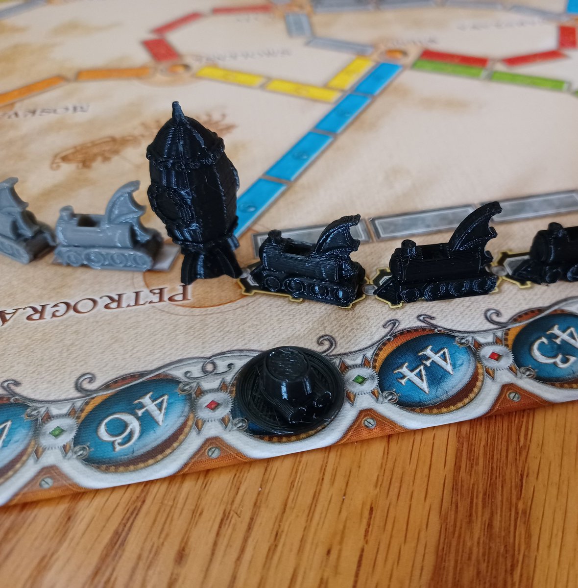 3dOrcs's tweet photo. Dracula plays Ticket to Ride with a set of my Steampunk game pieces. He likes the batwing tailfins! What do you think?

Etsy shop link is in my profile.

#halloween #boardgames #etsy #3dprinting https://t.co/1SJ8ula2IO