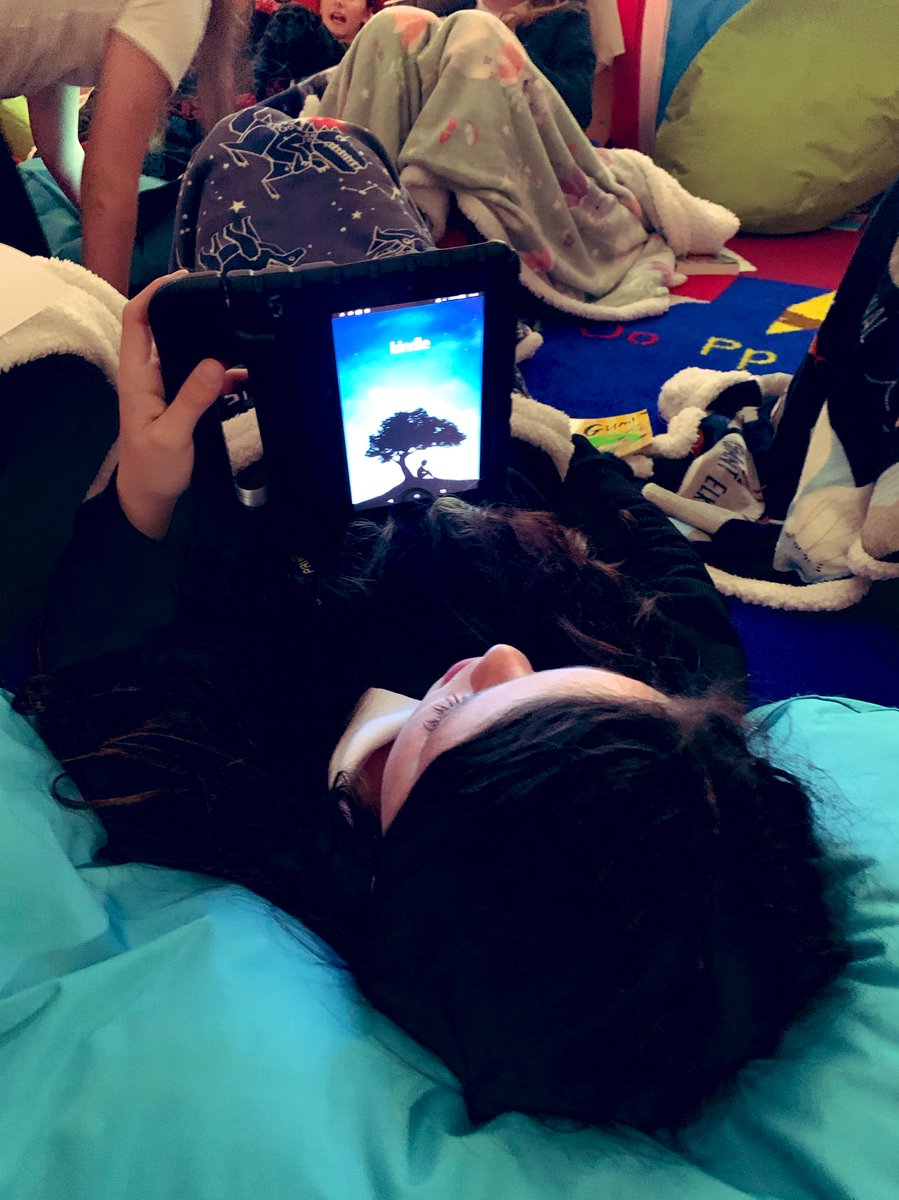 jillmq80's tweet photo. Finally, we have reopened our school library 😀 We celebrated with the relaunch of our after school book club. Chilled out, relaxed, comfy reading at its best with a book blether, book recommendations and a book wave at the end. Amazing!

#comfyreading

@SLCLiteracy @OpenUni_RfP https://t.co/yqWfNadD8P