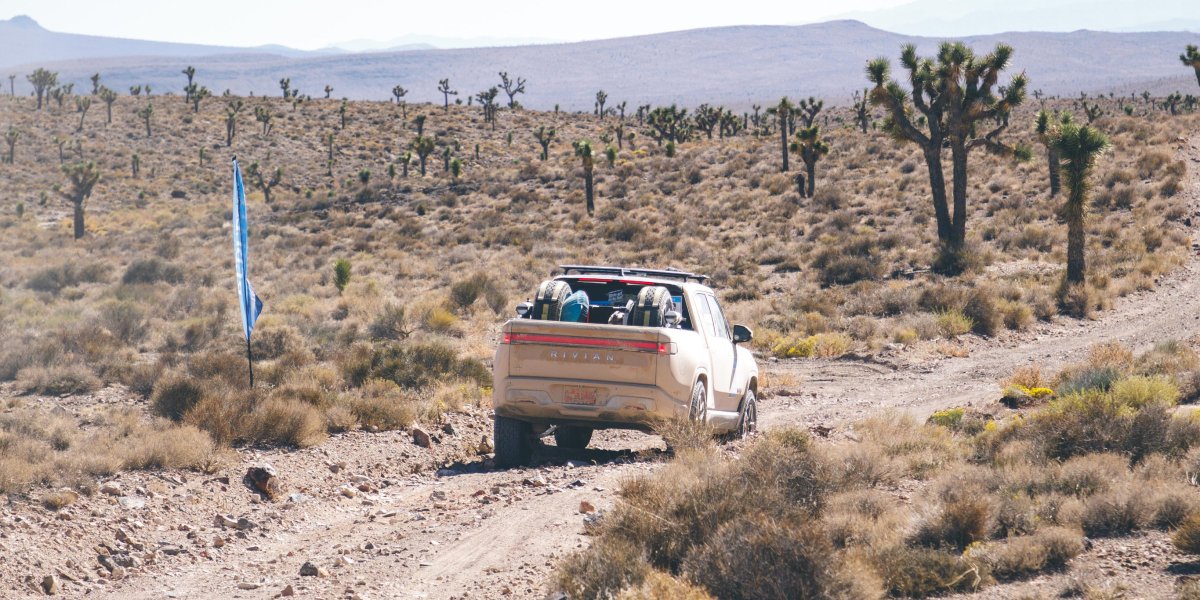 Rivian's tweet photo. Teamwork. Trust. Grit. These are the things that matter most at @rebellerally, the first women’s off-road navigation competition in the United States. Congratulations to driver Emme Hall and navigator Rebecca Donaghe, who with their R1T placed fifth of 42 teams in the rally. 🌵⚡️ https://t.co/WtcyI8RBbB
