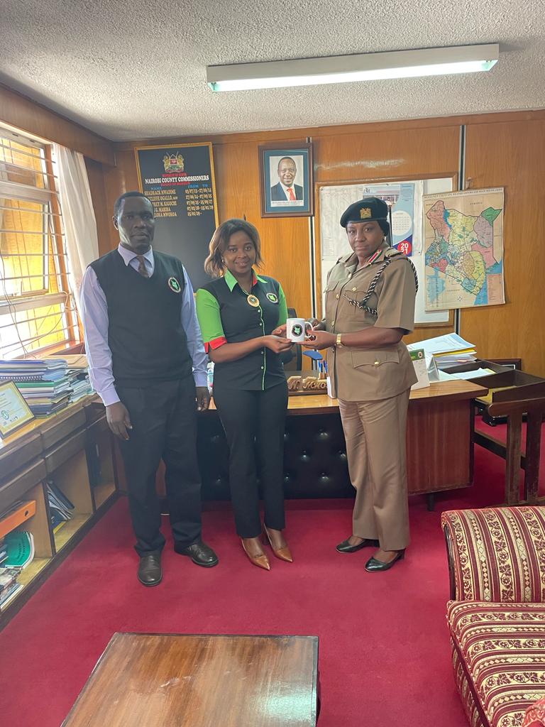 CrimeMustFall's tweet photo. Dr.Kirimi, Ruth Kendi, Nrb County Commissioner, Madam Flora Mworoa, receives PCAK brand gifts presented to her by the team earlier in the day. https://t.co/bYI5rvfVWa