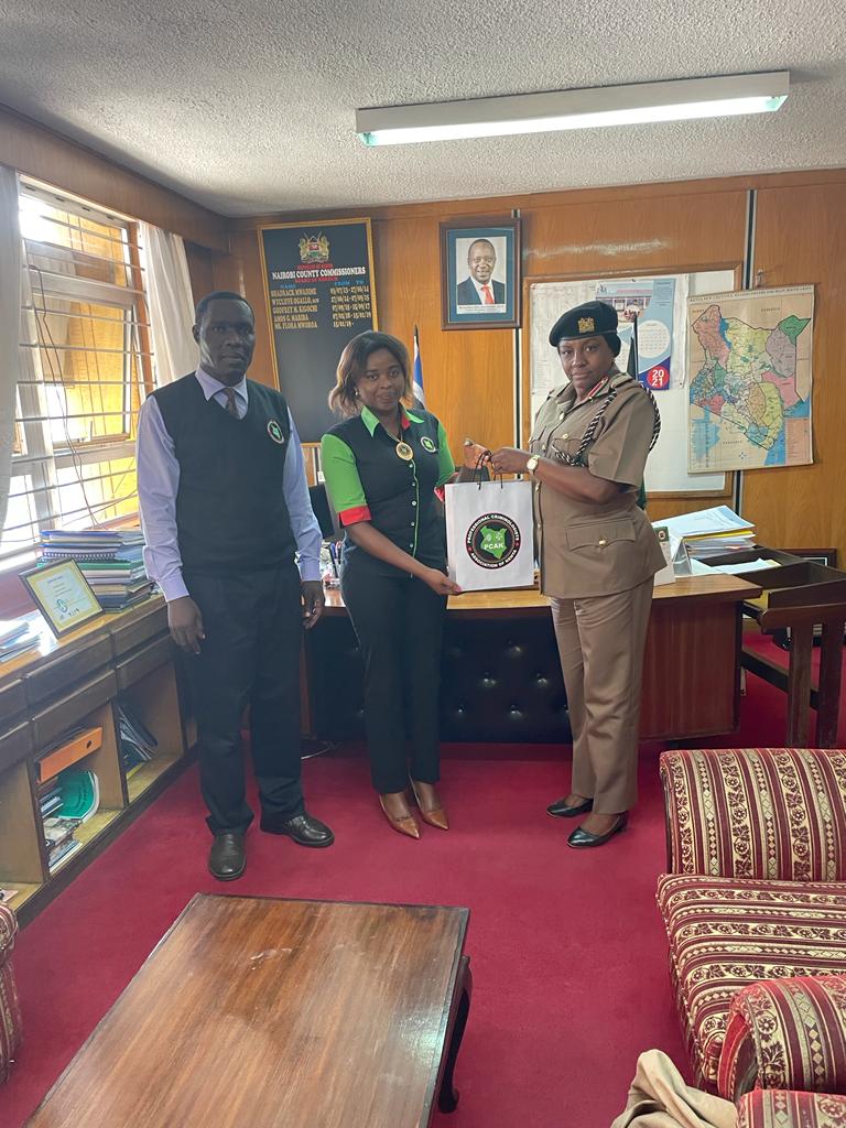 CrimeMustFall's tweet photo. Dr.Kirimi, Ruth Kendi, Nrb County Commissioner, Madam Flora Mworoa, receives PCAK brand gifts presented to her by the team earlier in the day. https://t.co/bYI5rvfVWa