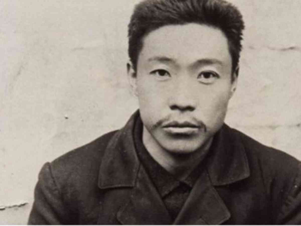 Ahn Junggeun portrait taken after his capture. He has a thin moustache and short hair. He is wearing a dark coat. He has a kind but intense gaze