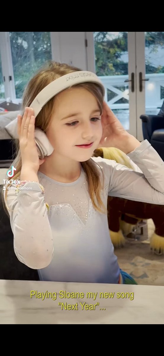 macklemore's tweet photo. Sloane hears my song for the first time 😂 https://t.co/OBdpDnmrob #nextyear https://t.co/5O8rCFnRSn
