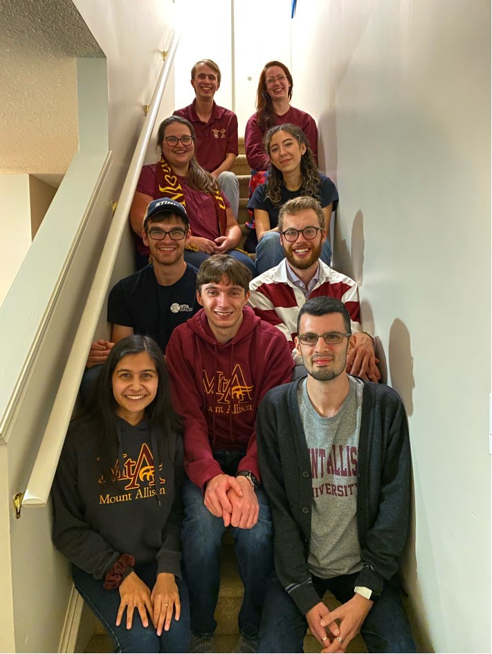 mta_physics's tweet photo. Loving this impromptu gathering of MTA alum in Waterloo last week!  We miss you! 
back to front
Graeme Zinck ’20, Maeve Wentland ’18,
Hayley Reid ’18, Saralin Zassman ’21,
Micah Stairs ’17, Everett Patterson ’20,
Finn Lidbetter ’17, Nikhita Vinod ’17, Olivier Bourgeois ’18 https://t.co/9afnVpKtdX
