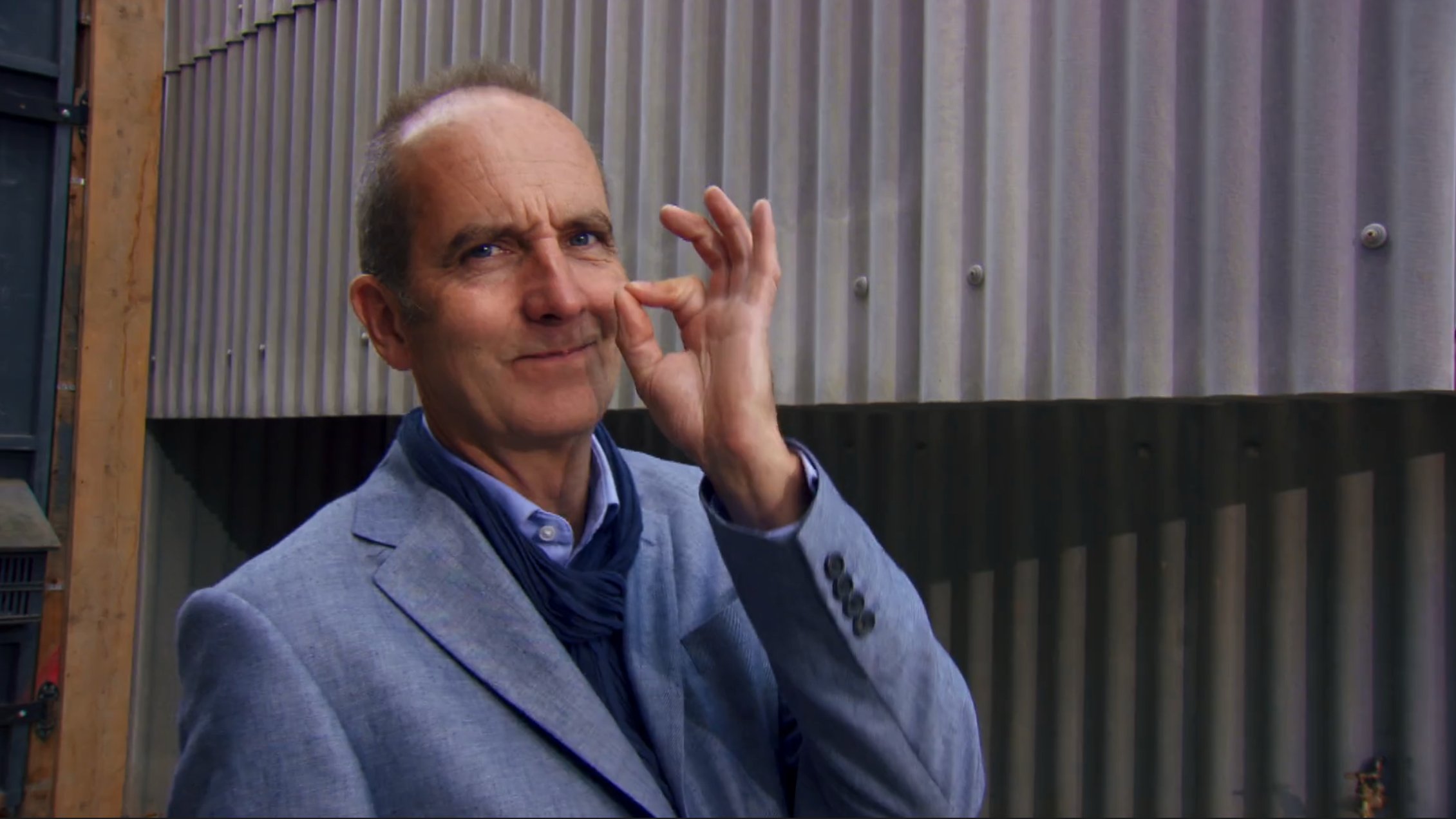 Kevin making the "ok" hand gesture