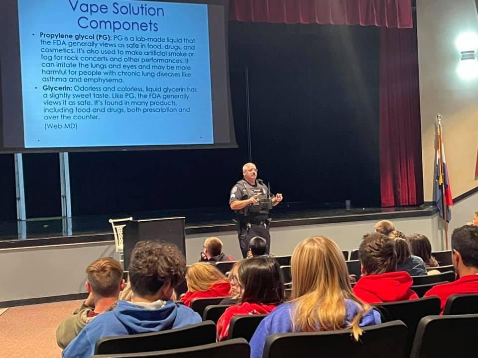 MrsCurran_CCMS's tweet photo. CCMS kicked off Red Ribbon Week by wearing red and getting a visit from Officer Jensen from the Plattsburg Police Department. He talked to our students about the dangers of drugs and vaping. The students also signed a pledge to remain drug free. @CCMSTigers #RedRibbonWeek https://t.co/uPExvFWRCL