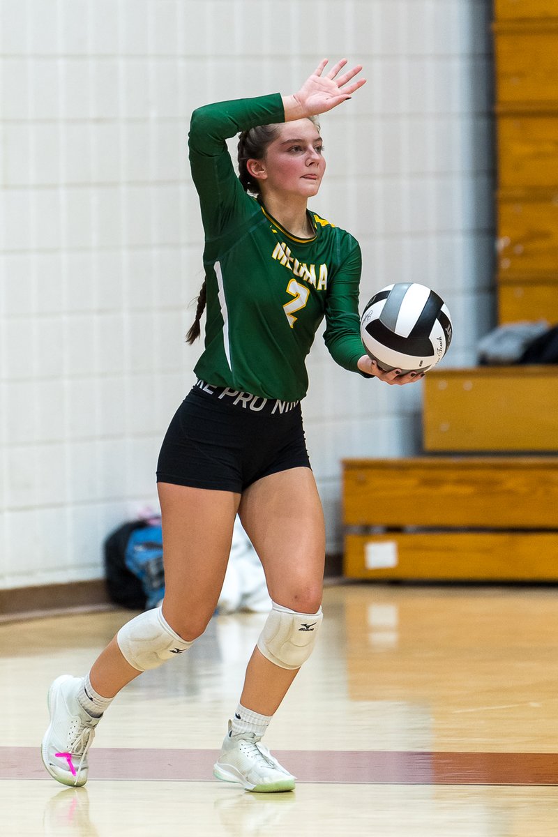Medina's <a href="/chloewise22/">Chloe Wise</a> prepares a serve to Mags. <a href="/MedinaGrlsVball/">Coach Joe</a>