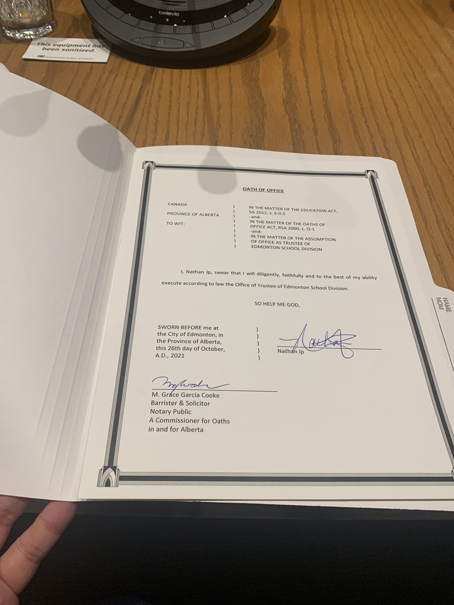 NathanIpYEG's tweet photo. I’m deeply honoured to be sworn in today for a 3rd term as #epsb trustee for southwest #yeg #wardh. I’m also proud to share that moment with my dad & to honour my family’s heritage in a small way by swearing an oath on our family sutra (Buddhist holy book) #abed #diversity https://t.co/RQEXDfVbWB
