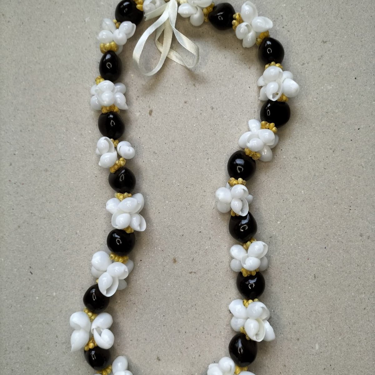 shellworksph's tweet photo. We are a direct manufacturer and producer of Kukui Nut leis from Cebu, Philippines. Please message for more details. 

#kukui #leis #kukuinecklace #lumbang #kukuilei https://t.co/bj4Dk95Lii