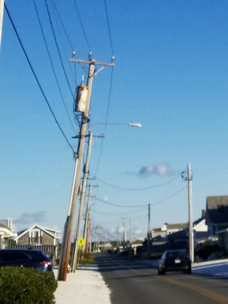 Always thought the leaning power poles on Shore Rd were quaint. Now I'm like,'Got it.' #noreaster #nopower #nosleeping #wickedwindy #truroma #outercape #capecod