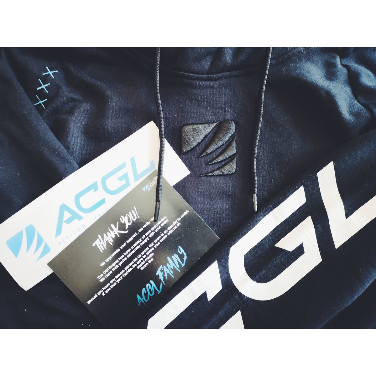 Skreewolf's tweet photo. The ACGL OG01 hoodie landed today. The quality & detail on this is tops. Shout-outs to @AfricanGaming. Stoked that I was able to cop the first drop. Only prob is arguing with @AdeleyMeow on who is going to wear it out & about. #ACGL #Hoodie #OG01 🔥💛 https://t.co/x8BhlUsZ58
