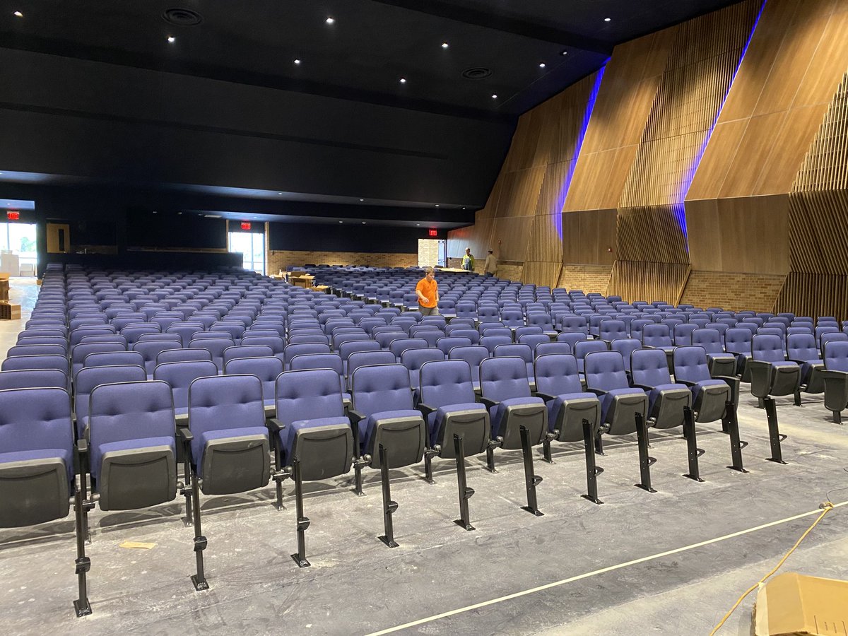 Seats are being installed in the Chrisman auditorium. The space looks great. Getting closer to completion.