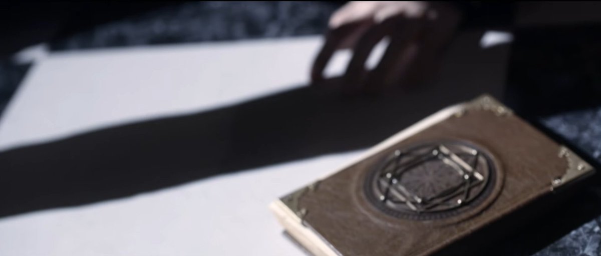 TXTFROMlS's tweet photo. also all the tools we’ve seen throughout all the mvs are in the table of the sorcerer which means he’s most likely the mastermind of everything https://t.co/xXyNQFrzeR
