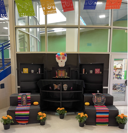 Great Dia De Los Muertos display here <a href="/sciencehallsuns/">Science Hall ES</a> Can't wait to see it get filled with honors.