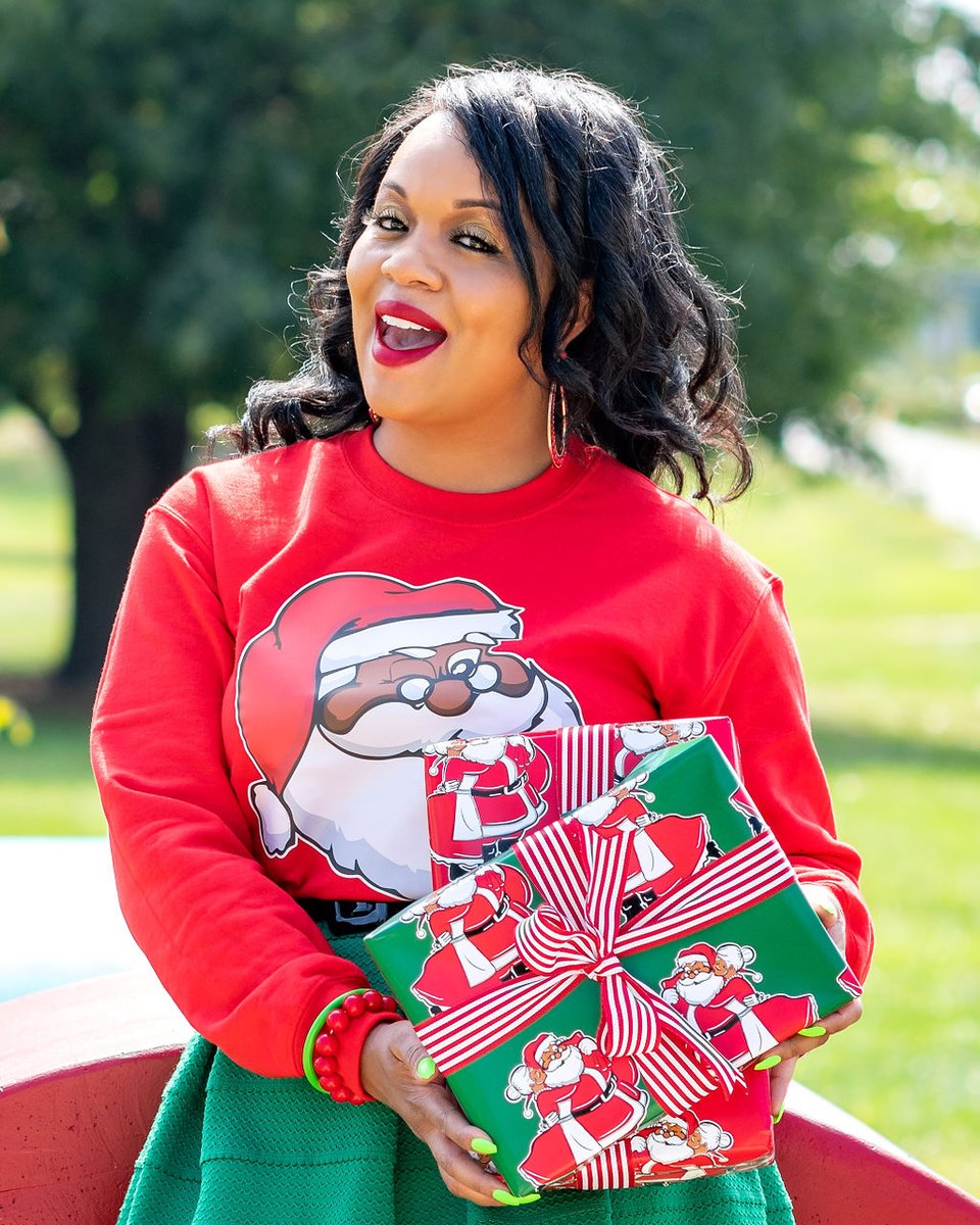 MadeInGSO's tweet photo. A fully-formed Christmas business concept came to Brooke Carrington while she was sleeping: Wrapper’s Delight, a holiday wrapping paper featuring a Black Santa Claus. https://t.co/k9ABDsszP4 #soGSO #MadeinGSO #AggiePride https://t.co/7gUN8Tytzf