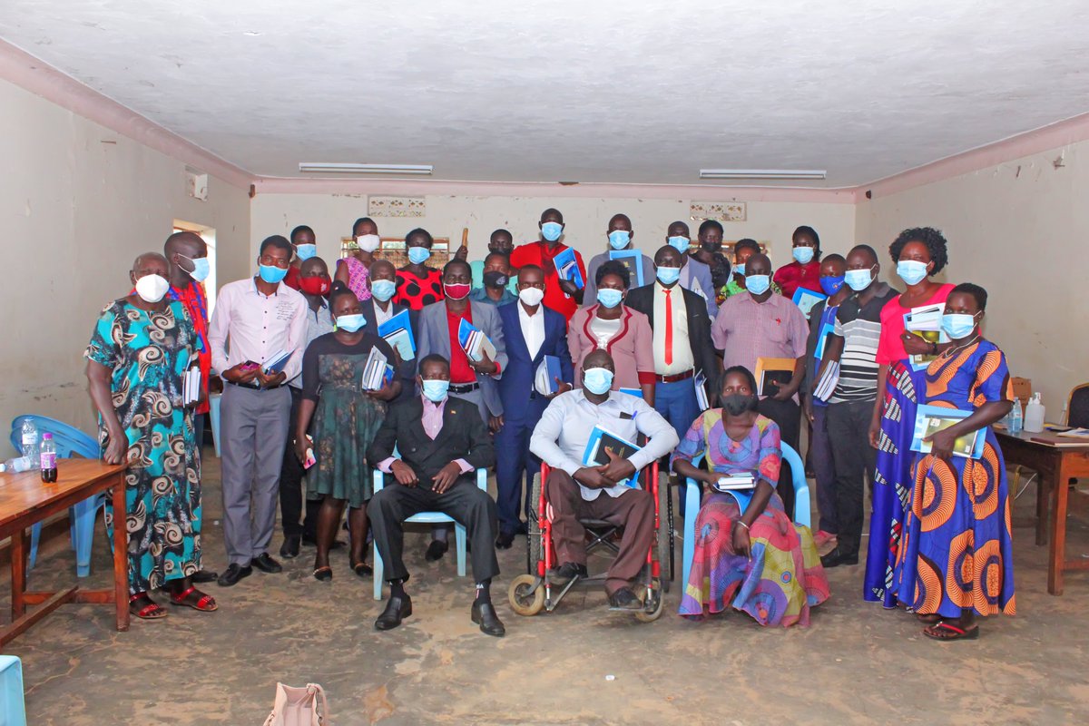 ACSETUganda's tweet photo. They received with a heartfelt gratitude! #PRUDEV, a GIZ project funded by @BMZ_Bund and @EUinUG delivered council books (Constitution, Local government Acts, Council Rules of Procedures and #LED Policy to the District councillors of #Otuke District through #ICONACSET consortium. https://t.co/2K3GG9QcoB
