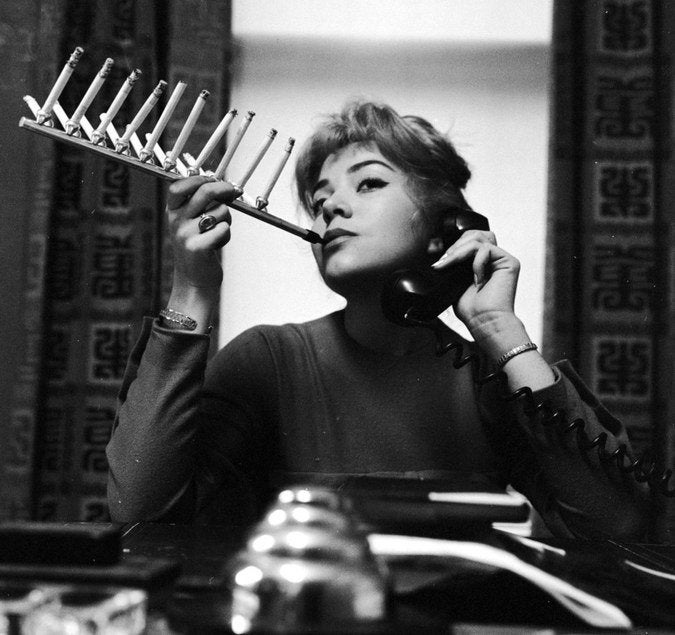 DrPopCultureUSA's tweet photo. A 1955 device to smoke an entire pack of cigarettes at once. #PopCulture https://t.co/OrgzkWgj2f