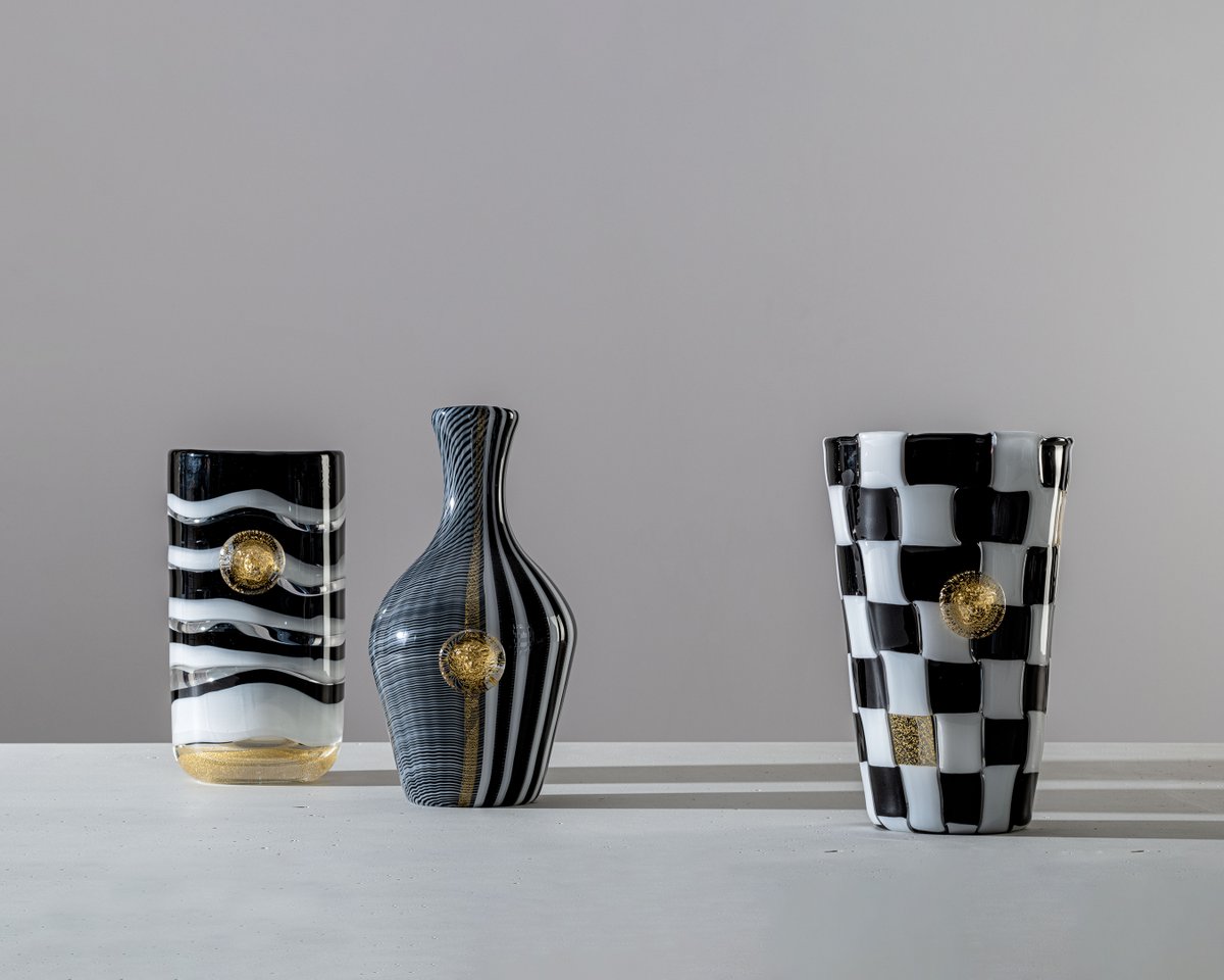 Versace's tweet photo. The combined efforts of #VersacexVenini has given life to three prestigious vase creations: VVV, SMOKING and GESSATO, all skilfully made following three different artisanal techniques and finished with an iconic gold-leaf Medusa. Discover more here: https://t.co/vgatWOWyNv https://t.co/s57l0Ng8ju