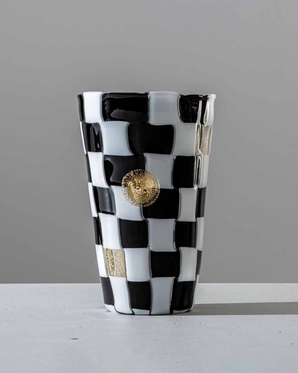 Versace's tweet photo. The combined efforts of #VersacexVenini has given life to three prestigious vase creations: VVV, SMOKING and GESSATO, all skilfully made following three different artisanal techniques and finished with an iconic gold-leaf Medusa. Discover more here: https://t.co/vgatWOWyNv https://t.co/s57l0Ng8ju