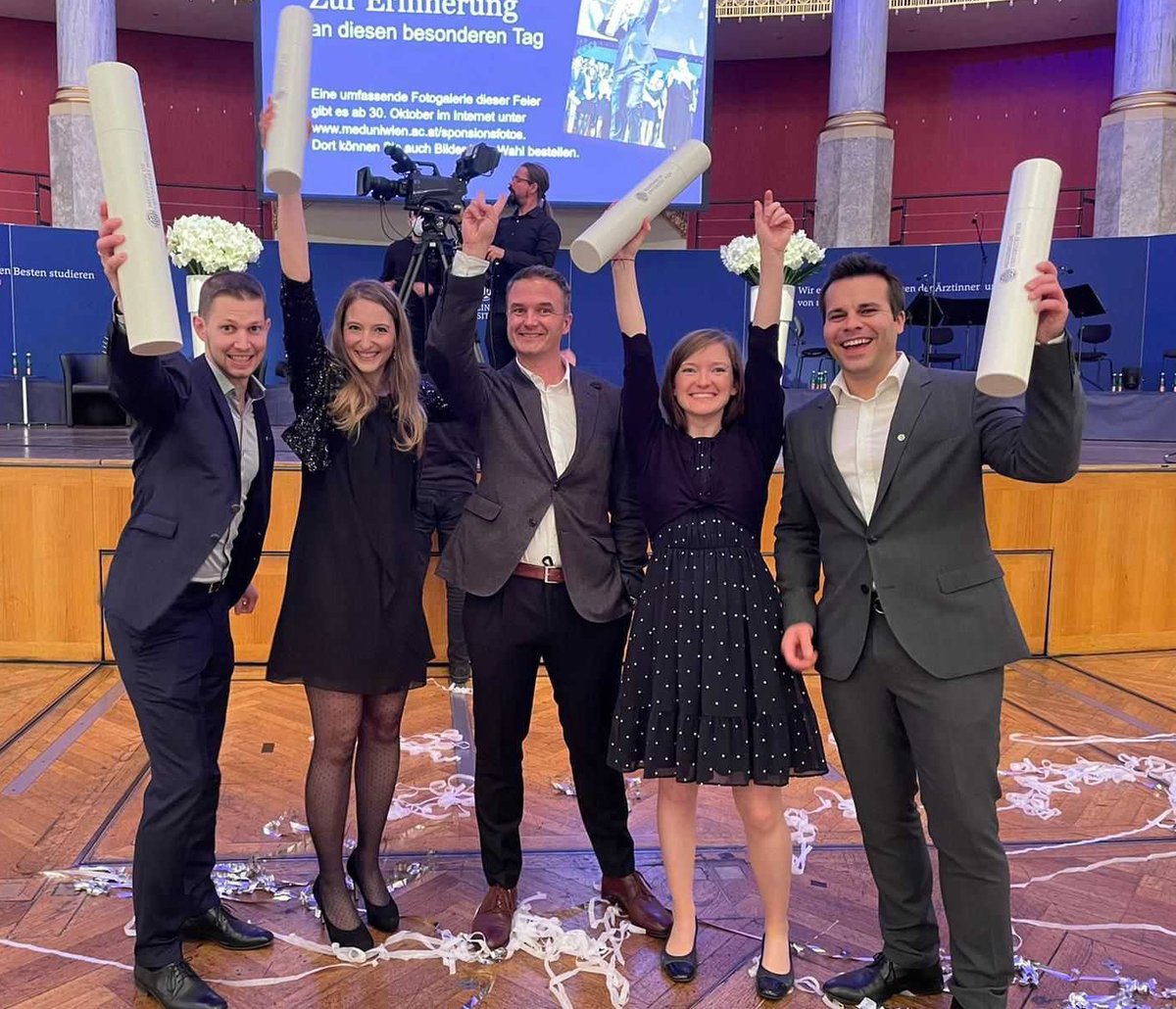 HeyesElizabeth's tweet photo. We finally had our graduation ceremony yesterday!🎉👩‍🎓🥳 Many thanks to @MedUni_Wien for the lovely ceremony, my PhD companions @Luisa_M_Schmidt, @JoeySc1 and twitterless Stefan Terlecki-Zaniewicz, and of course to our fantastic supervisor @florian_grebien! #proud #grebienlab https://t.co/F1KAUT35MO