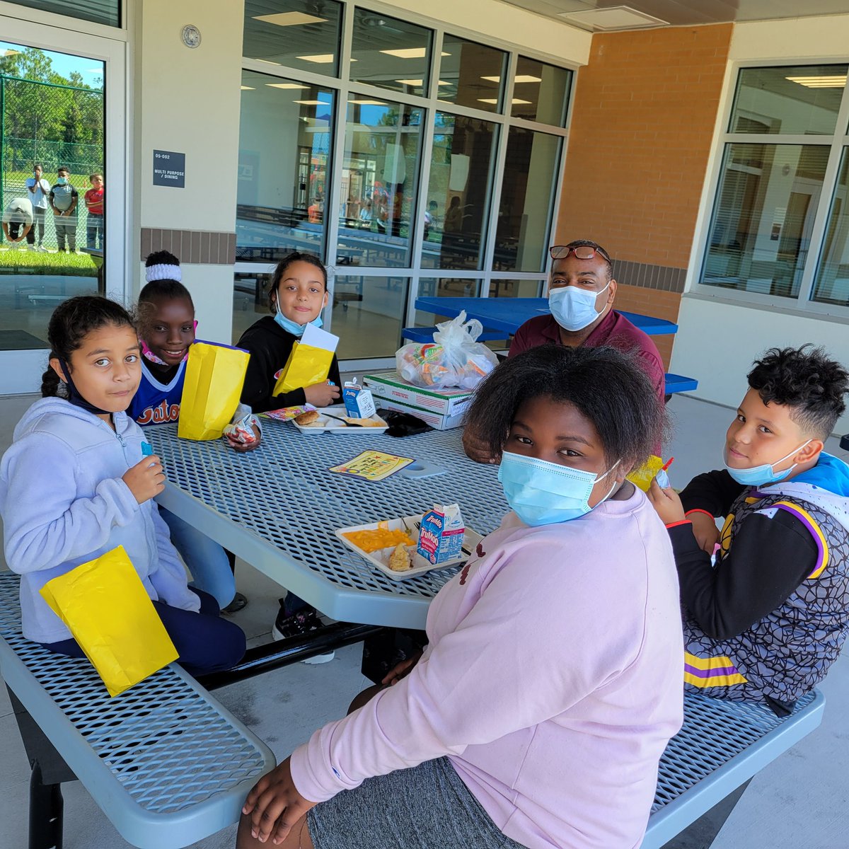 These awesome fourth grade October students of the month at Westside celebrating having  lunch with the principal.