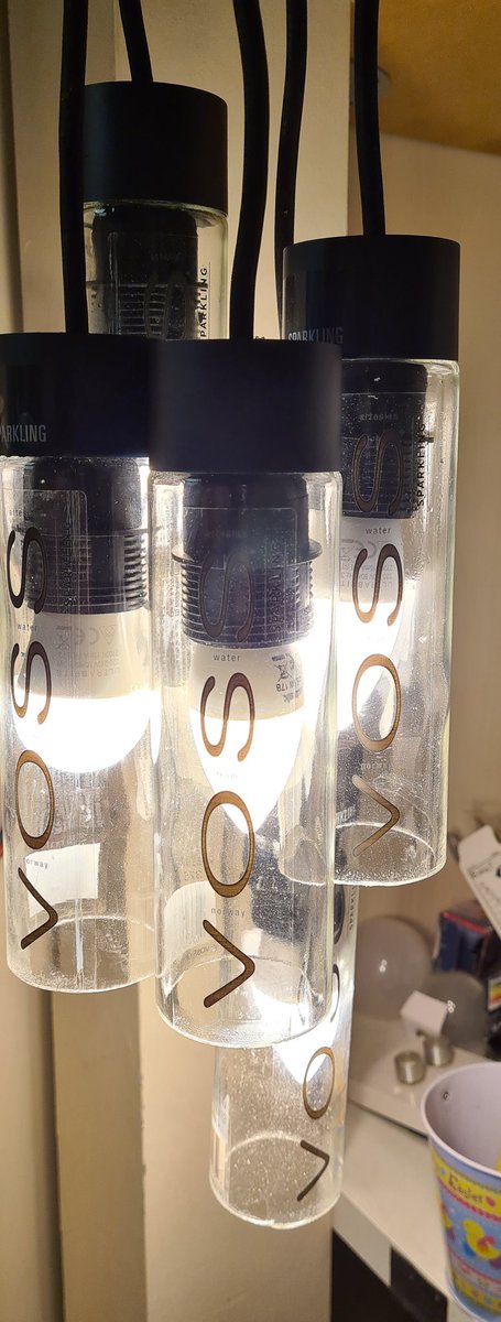 Light fitting made from <a href="/vosswater/">Voss Water</a> empties. #upcycled
