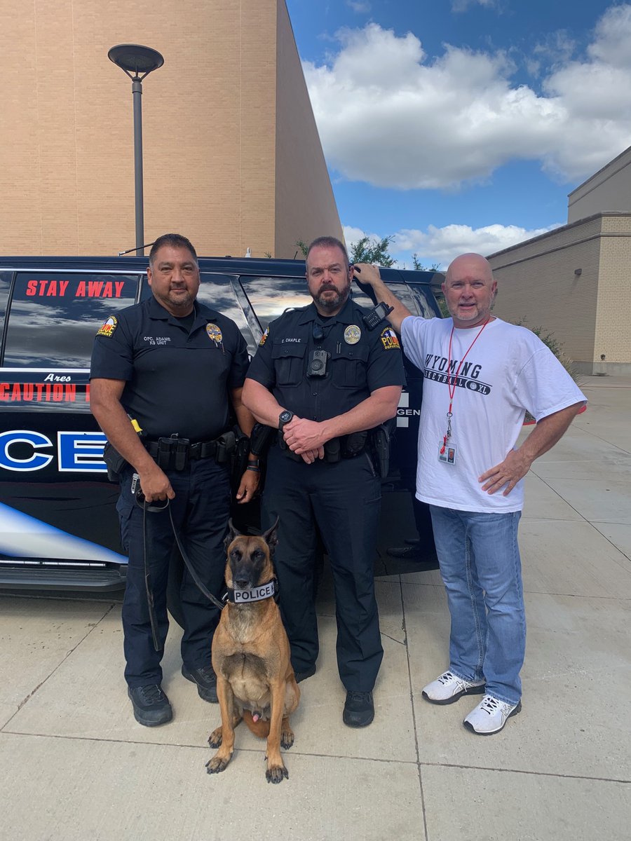 FlowerMoundPD's tweet photo. @M9SRO Chaple, Officer Adame, and Officer Ares conducted a K-9 presentation @MHS9th campus today as part of MH9's Red Ribbon Week festivities. https://t.co/0UWEsb03kL