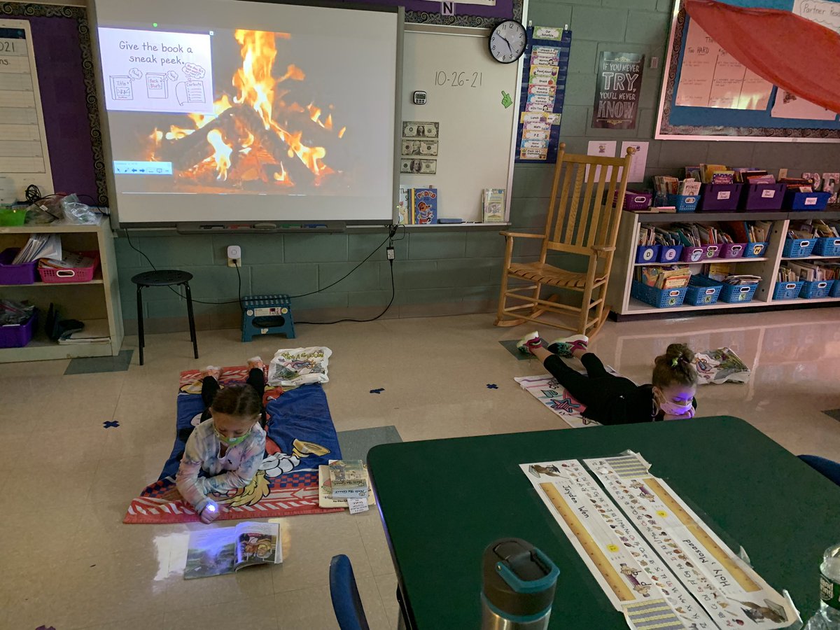 jkroll205's tweet photo. Reading by our campfire 🔥 on Camping Day! 🏕📖📚 https://t.co/STPjyU4Q3a