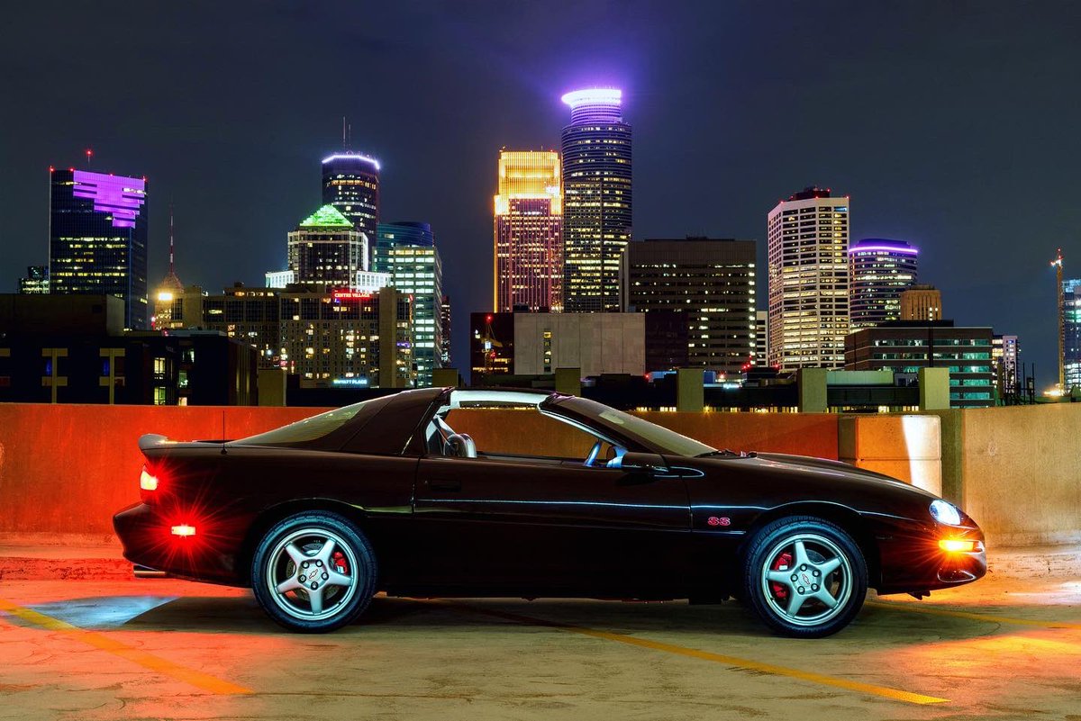 StimulightNight's tweet photo. 1999 Chevy Camaro SS 🔥 Thanks to my buddy WestR for letting me shoot his Camaro and for finding this awesome location with the Minneapolis skyline. 🌃  #lightpainting #mplsskyline #chevycamaro #stimulightthenight https://t.co/5ivYKcKaLi