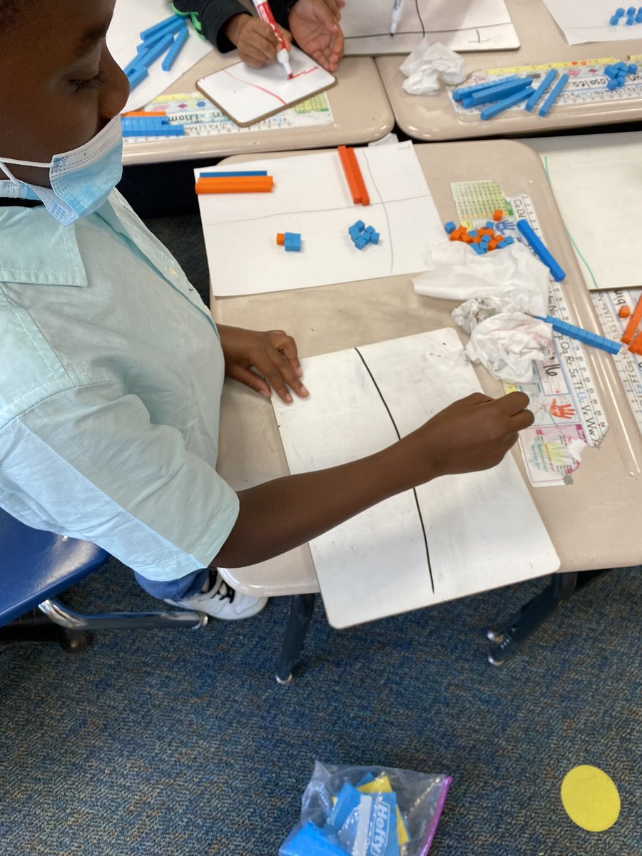MrsGarciaMath's tweet photo. Practicing addition with regrouping using our base ten blocks and place value charts went great today! @McMullanElem https://t.co/AZvSdfQzVo