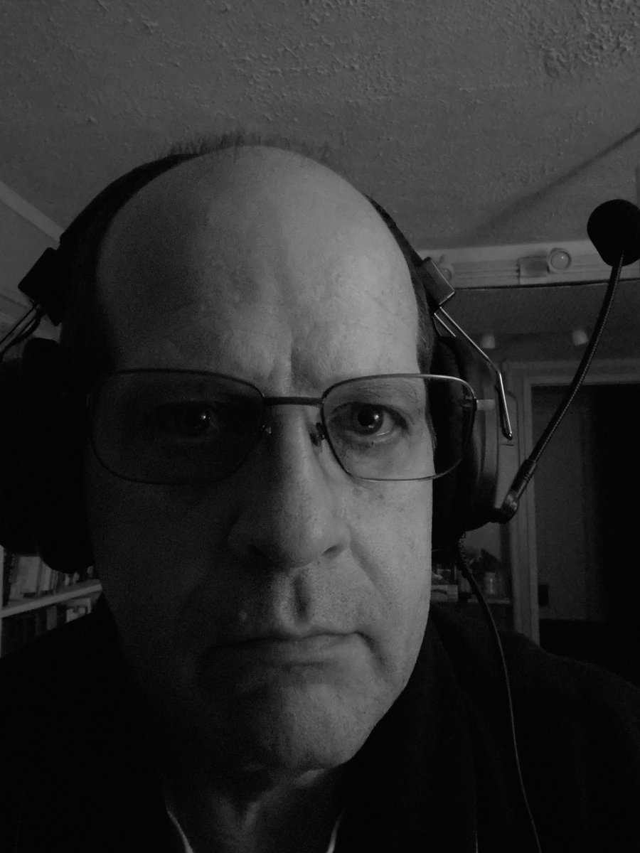 Deathdog18's tweet photo. #AdobeMAX settling in to catch up on everything I missed today because work. Noir selfie attempt. https://t.co/O8NO7AatXH