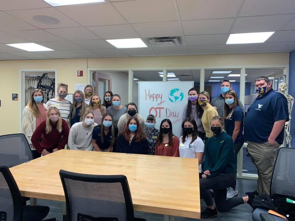 WVUSOTA's tweet photo. Happy World OT Day from our first year students!💙💛🤍 “Belong. Be you.”🌎 #wvuOT #WorldOTDay https://t.co/RM13jc6aSn