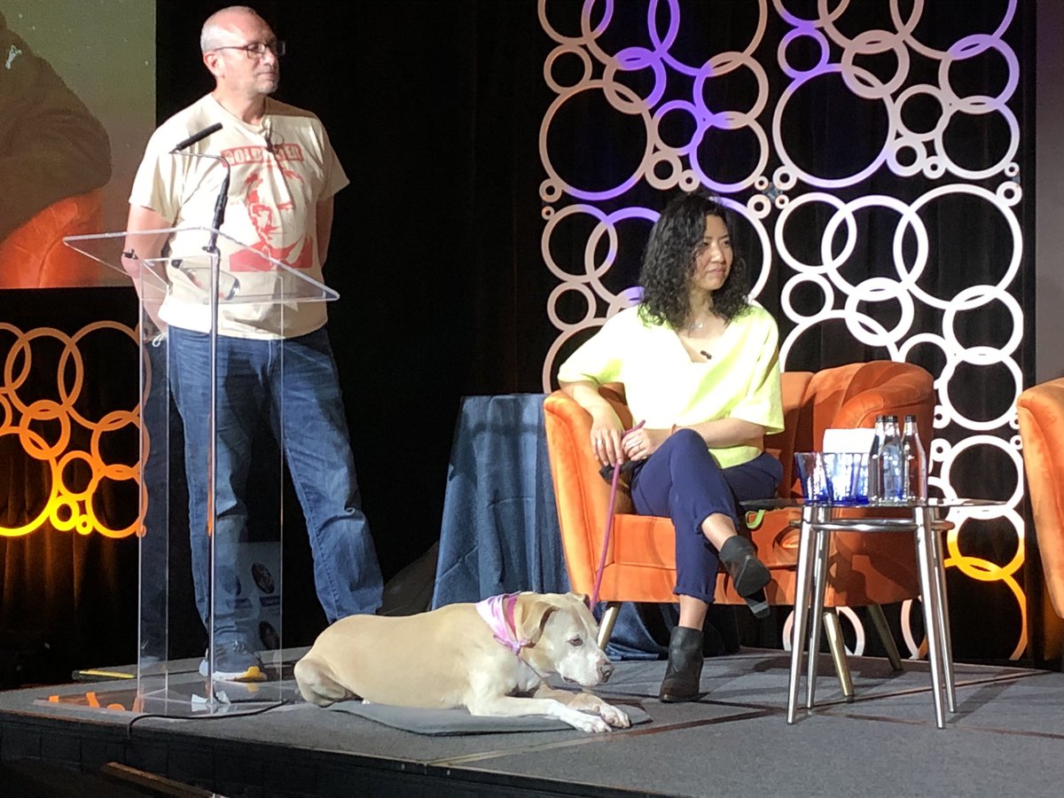 TwoLineStudios's tweet photo. Stump the Chump! Look at this sweet pup on the stage with dog-momma @triciawang!
#CCE2021 

#Dataintelligence #dogmomma #ailabor @jeggers @ekolsky @mikeni @ariqayumi https://t.co/Sh6AhCT15X