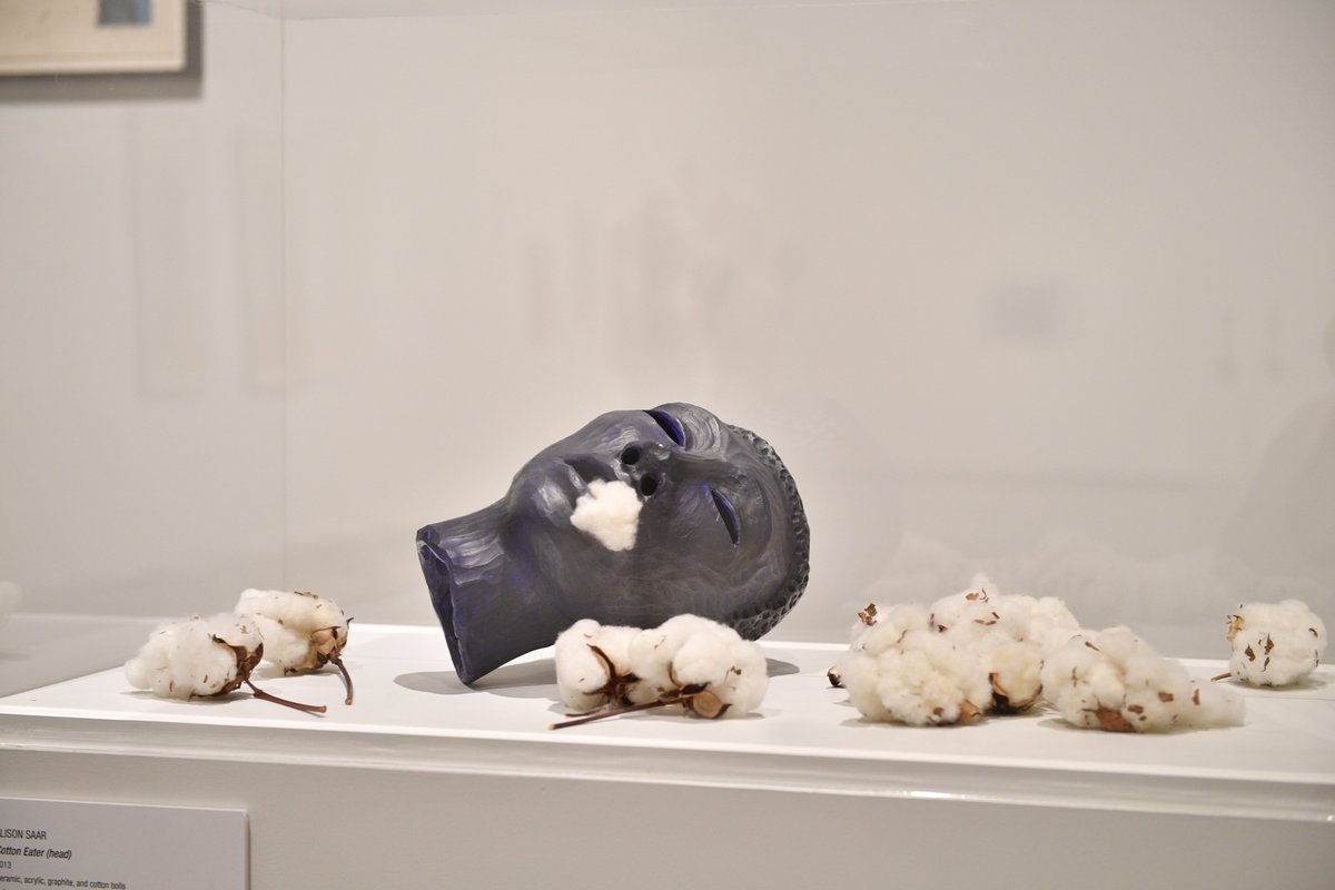Alison Saar, Cotton Eater (head), 2013, Ceramic, acrylic, graphite, and cotton bolls. Alison Saar depicts a female eating cotton bolls to ward off hunger, evidence of the horrors suffered by slaves in the cotton industry.#WSU #WSUartmuseum #GoCougs #AlisonSaar #jschnitzerff